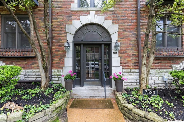 7520 Buckingham Dr Unit 1W, Saint Louis, MO 63105 - property entrance with brick siding