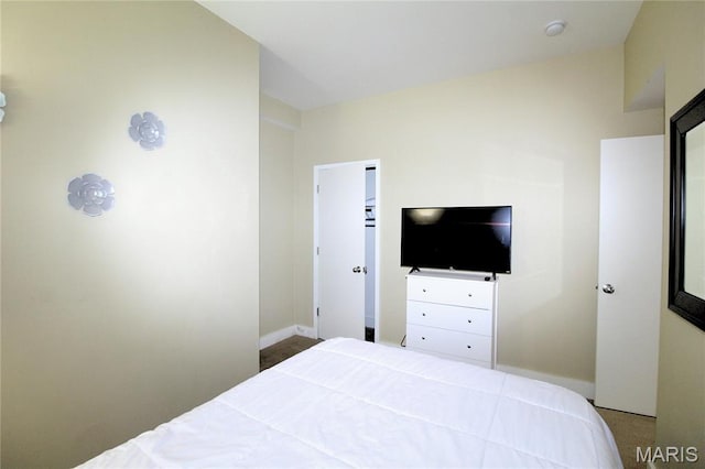 314 N Broadway Unit 603, Saint Louis, MO 63102 - carpeted bedroom featuring baseboards
