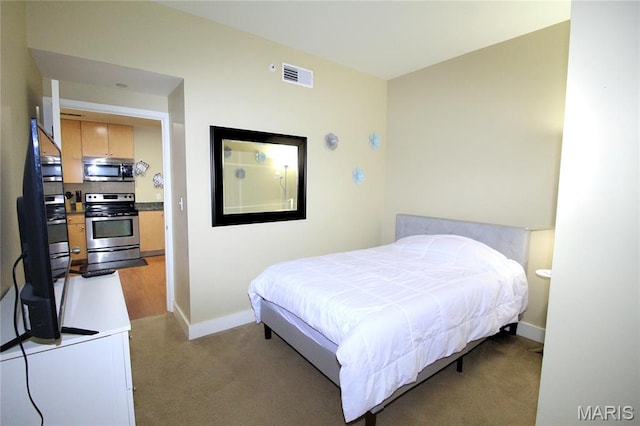 314 N Broadway Unit 603, Saint Louis, MO 63102 - bedroom featuring light carpet and baseboards