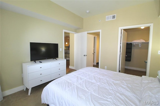314 N Broadway Unit 603, Saint Louis, MO 63102 - bedroom featuring carpet and baseboards