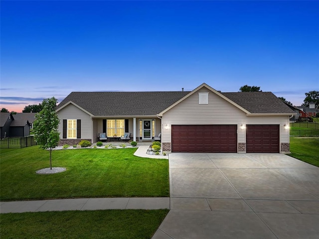 217 Arlington Dr, Moscow Mills, MO 63362 - single story home with covered porch, an attached garage, concrete driveway, roof with shingles, and brick siding