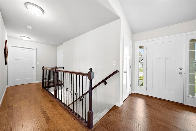 217 Arlington Dr, Moscow Mills, MO 63362 - entryway with hardwood / wood-style flooring, baseboards, and healthy amount of natural light