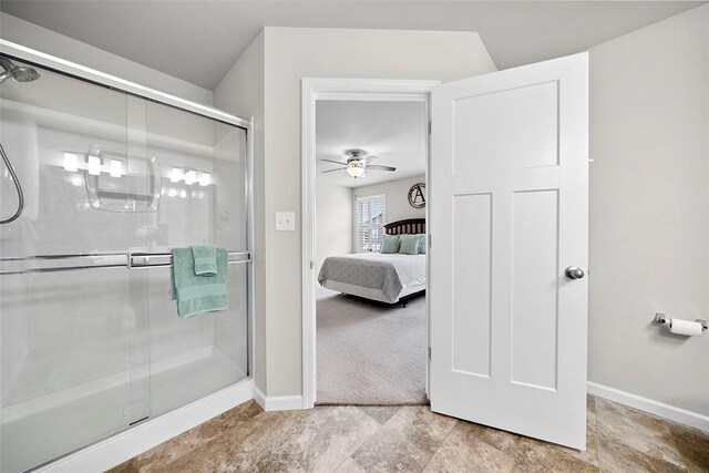 217 Arlington Dr, Moscow Mills, MO 63362 - ensuite bathroom featuring baseboards, a stall shower, and ceiling fan