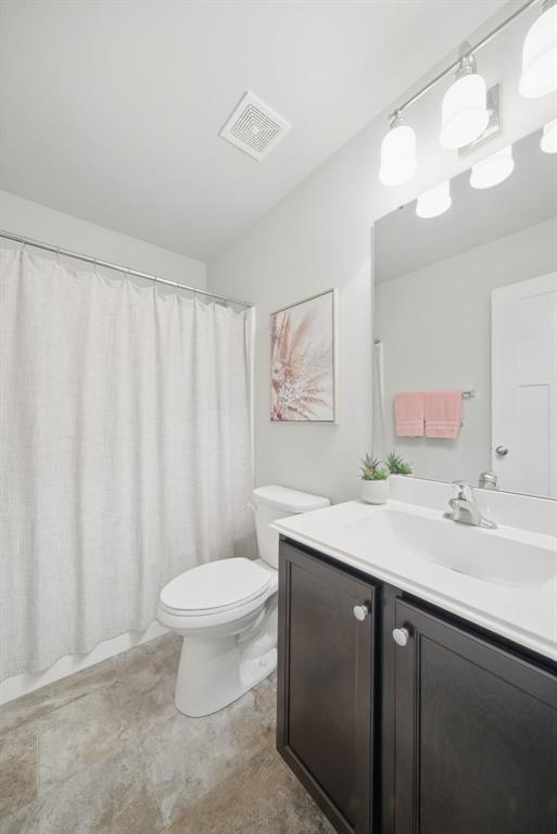 217 Arlington Dr, Moscow Mills, MO 63362 - bathroom with vanity and toilet