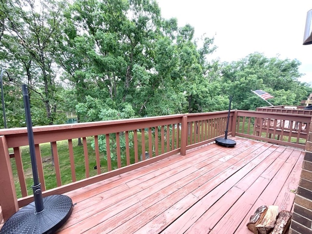 18318 Lakeview Cir Unit 606, Monroe City, MO 63456 - wooden terrace featuring view of wooded area