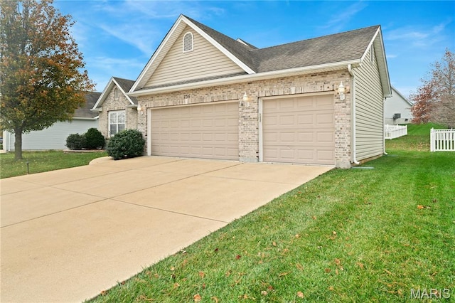 736 Berrywine Ln, Arnold, MO 63010 - view of front of house with a front lawn, concrete driveway, brick siding, an attached garage, and roof with shingles
