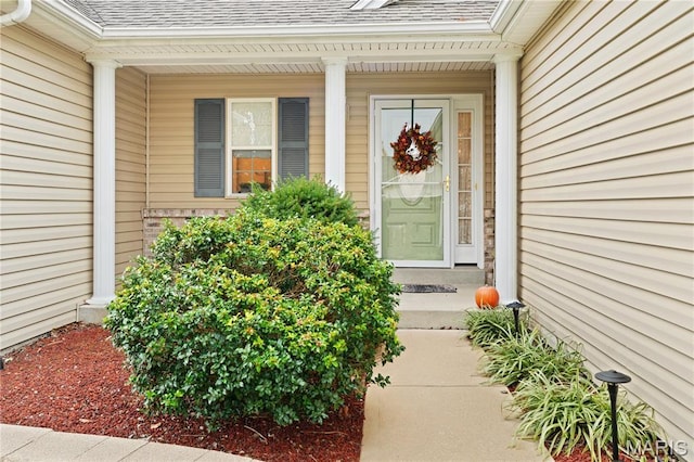 736 Berrywine Ln, Arnold, MO 63010 - entrance to property featuring roof with shingles and a porch