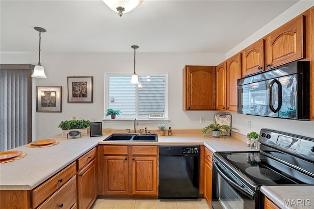 736 Berrywine Ln, Arnold, MO 63010 - kitchen with black appliances, brown cabinets, a peninsula, and light countertops