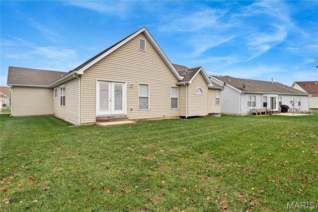 736 Berrywine Ln, Arnold, MO 63010 - rear view of property featuring a yard and entry steps