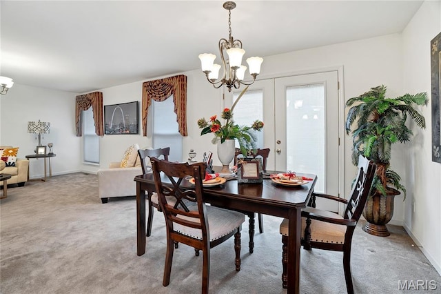 736 Berrywine Ln, Arnold, MO 63010 - dining area featuring a chandelier and light carpet