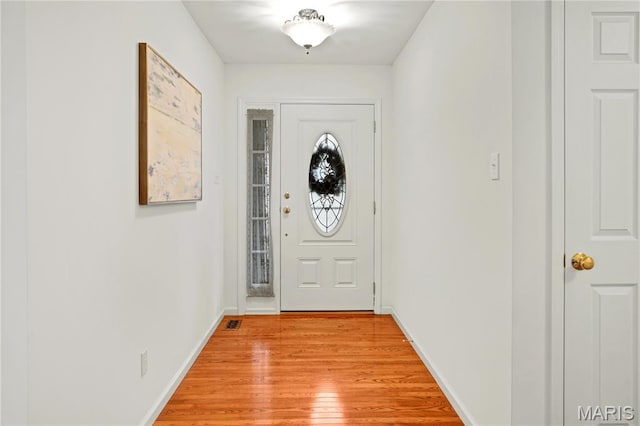 736 Berrywine Ln, Arnold, MO 63010 - doorway with light wood finished floors and baseboards
