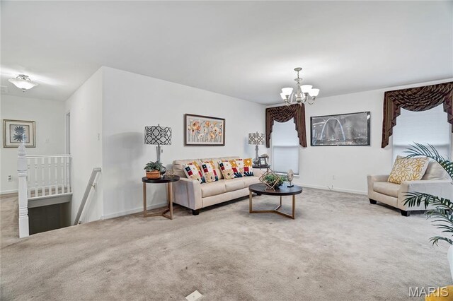 736 Berrywine Ln, Arnold, MO 63010 - carpeted living area with a chandelier and baseboards