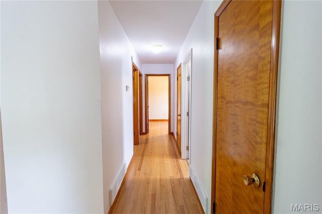 811 Bray Ave, Rolla, MO 65401 - hallway featuring light wood finished floors and baseboards