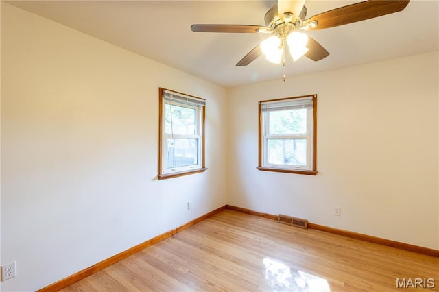 811 Bray Ave, Rolla, MO 65401 - empty room with light wood-style flooring, baseboards, and a ceiling fan