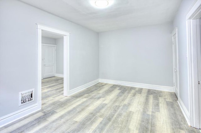 5027 S Broadway Ave Unit 1-4, Saint Louis, MO 63111 - unfurnished room featuring wood finished floors and baseboards