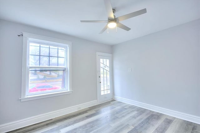 5027 S Broadway Ave Unit 1-4, Saint Louis, MO 63111 - unfurnished room with wood finished floors, a ceiling fan, and baseboards