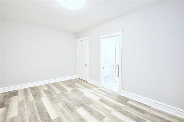 5027 S Broadway Ave Unit 1-4, Saint Louis, MO 63111 - empty room featuring light wood finished floors and baseboards