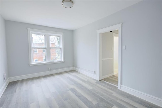 5027 S Broadway Ave Unit 1-4, Saint Louis, MO 63111 - empty room with light wood-type flooring and baseboards