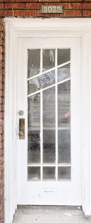 5027 S Broadway Ave Unit 1-4, Saint Louis, MO 63111 - view of exterior entry with brick siding