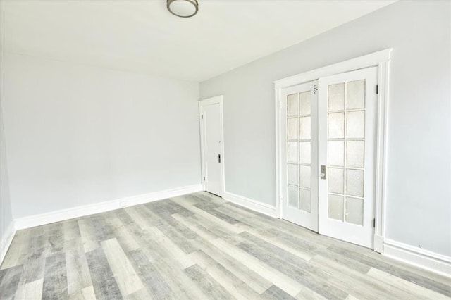 5027 S Broadway Ave Unit 1-4, Saint Louis, MO 63111 - unfurnished room featuring wood finished floors and baseboards