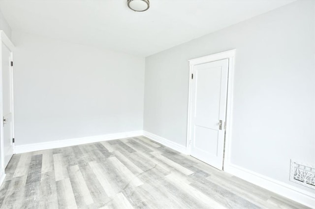 5027 S Broadway Ave Unit 1-4, Saint Louis, MO 63111 - unfurnished room with light wood finished floors and baseboards