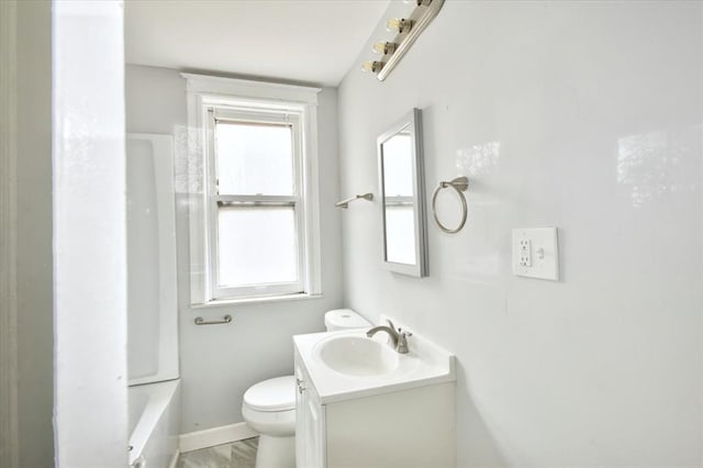 5027 S Broadway Ave Unit 1-4, Saint Louis, MO 63111 - full bath with toilet, vanity, and baseboards
