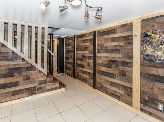 584 Watch Hill Rd, Collinsville, IL 62234 - interior space with wood walls, tile patterned flooring, and stairway