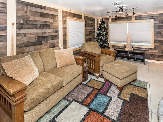 584 Watch Hill Rd, Collinsville, IL 62234 - living room with wooden walls and tile patterned flooring