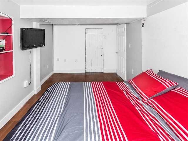 584 Watch Hill Rd, Collinsville, IL 62234 - unfurnished bedroom featuring wood finished floors and baseboards