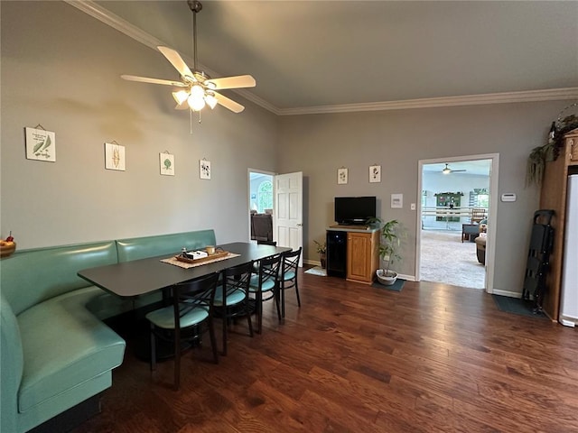 16 Siesta Dr, Hannibal, MO 63401 - dining room with ceiling fan, dark wood-type flooring, plenty of natural light, and crown molding
