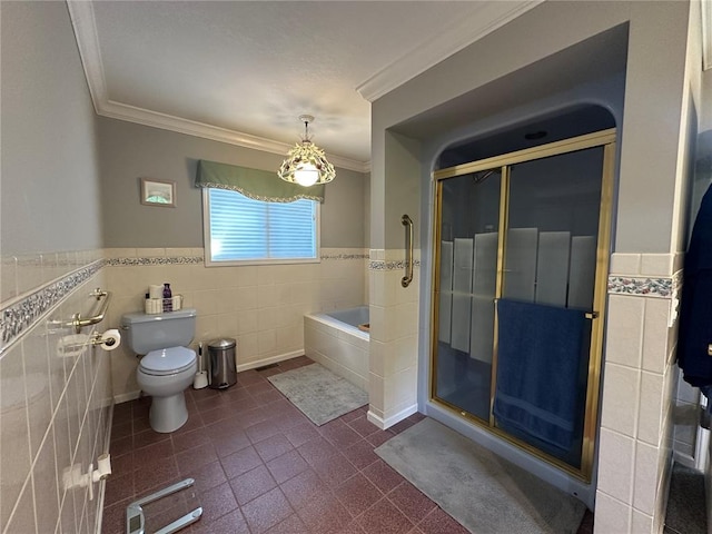 16 Siesta Dr, Hannibal, MO 63401 - bathroom featuring tile walls, a garden tub, crown molding, toilet, and a shower stall
