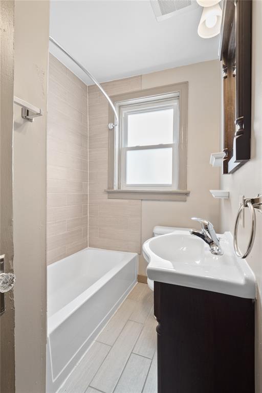 4932 Mardel, Saint Louis, MO 63109 - full bathroom with shower / washtub combination and vanity