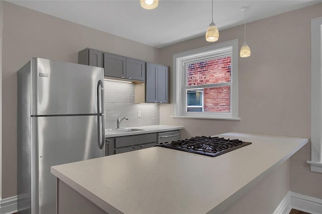 4932 Mardel, Saint Louis, MO 63109 - kitchen featuring freestanding refrigerator, gray cabinetry, stovetop, and a sink