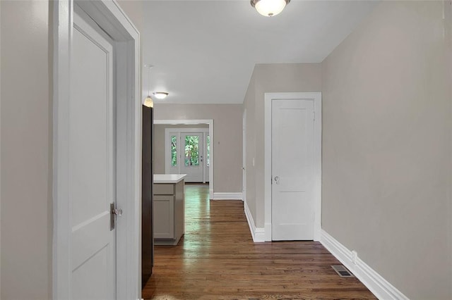 4932 Mardel, Saint Louis, MO 63109 - hallway featuring dark wood-style floors and baseboards