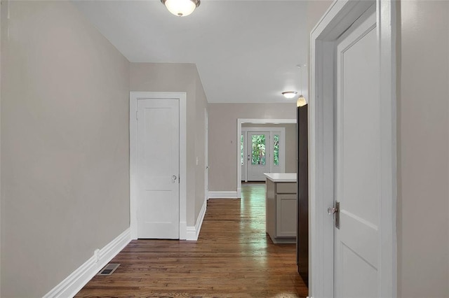 4932 Mardel, Saint Louis, MO 63109 - hallway featuring dark wood-style floors and baseboards