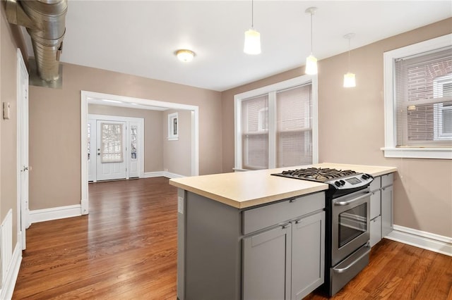 4932 Mardel, Saint Louis, MO 63109 - kitchen featuring gas stove, dark wood-style floors, gray cabinets, and baseboards