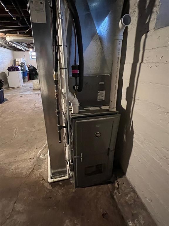 4932 Mardel, Saint Louis, MO 63109 - utility room featuring heating unit