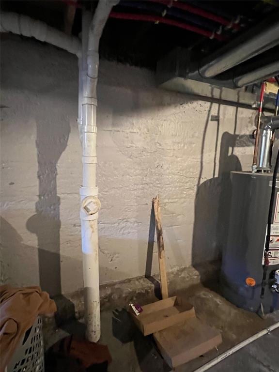 4932 Mardel, Saint Louis, MO 63109 - unfinished basement featuring water heater