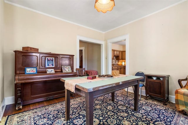7511 Milan Ave, University City, MO 63130 - home office featuring ornamental molding, baseboards, and wood finished floors