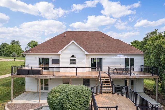 113 Riverwalk Dr, Desloge, MO 63628 - back of property with a wooden deck, a patio, stairway, and a shingled roof