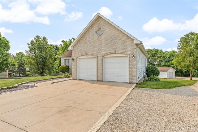 113 Riverwalk Dr, Desloge, MO 63628 - view of property exterior featuring brick siding, driveway, a lawn, and a garage