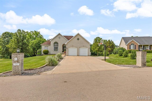113 Riverwalk Dr, Desloge, MO 63628 - view of front of house with a garage, driveway, and a front lawn