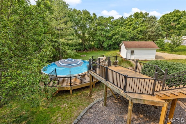 113 Riverwalk Dr, Desloge, MO 63628 - deck with a yard, an outdoor pool, an outbuilding, and stairs