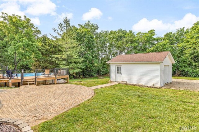 113 Riverwalk Dr, Desloge, MO 63628 - view of grassy yard featuring a wooden deck and an outbuilding