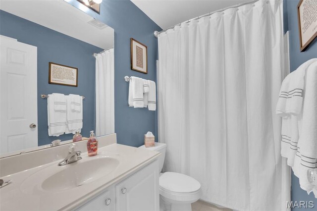 2654 Breckenridge Cir, Ofallon, MO 63368 - full bathroom with vanity, toilet, tile patterned flooring, and a shower with curtain