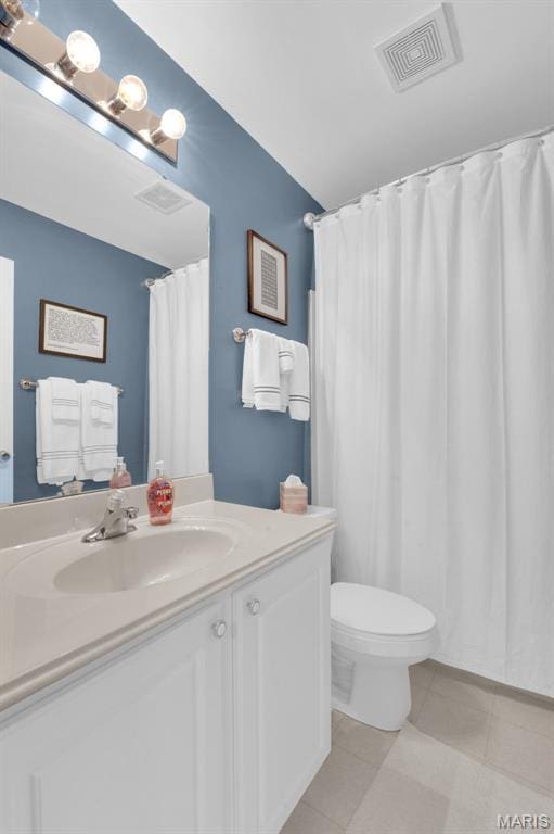 2654 Breckenridge Cir, Ofallon, MO 63368 - bathroom with vanity, toilet, and tile patterned floors