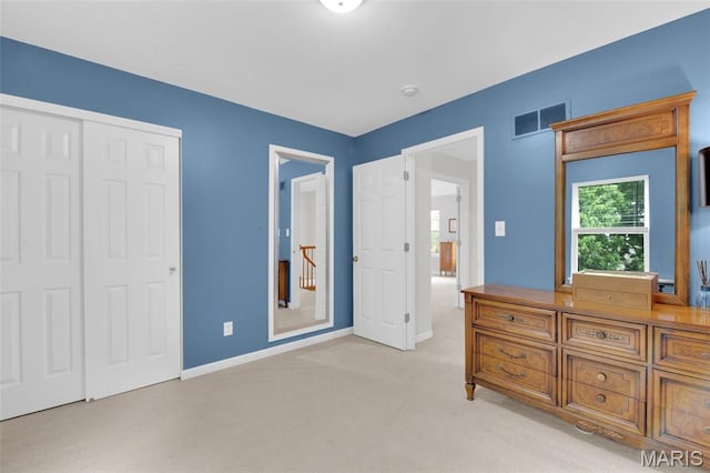 2654 Breckenridge Cir, Ofallon, MO 63368 - bedroom featuring light colored carpet, a closet, and baseboards