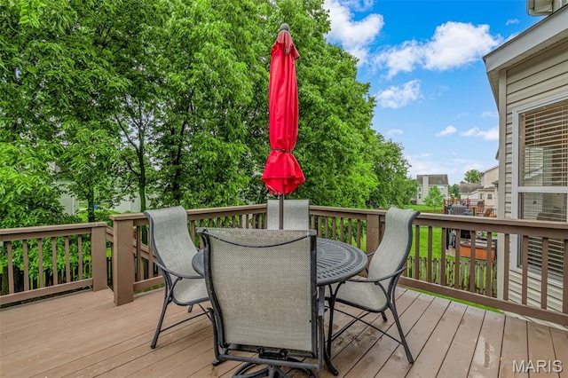 2654 Breckenridge Cir, Ofallon, MO 63368 - wooden terrace with outdoor dining area