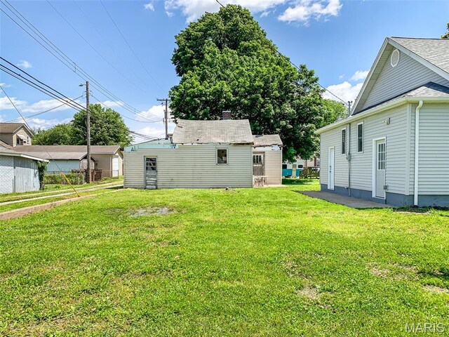 526 State St, Dupo, IL 62239 - view of green lawn with an outbuilding