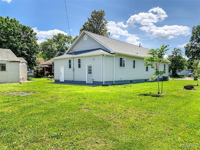 526 State St, Dupo, IL 62239 - rear view of property featuring a yard and roof with shingles